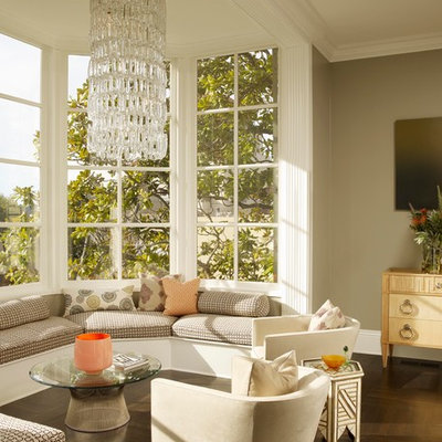 Eclectic dark wood floor and brown floor living room photo in San Francisco with green walls