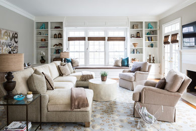 Living room - large traditional open concept medium tone wood floor living room idea in DC Metro with gray walls, a standard fireplace, a stone fireplace and a wall-mounted tv