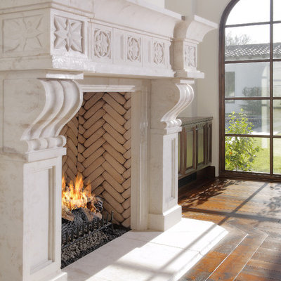 Inspiration for a mediterranean living room remodel in Phoenix with a standard fireplace
