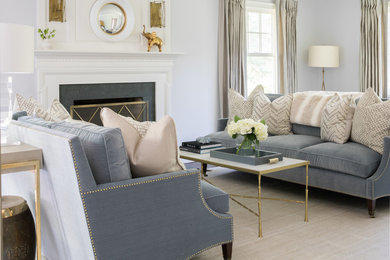 Design ideas for a classic formal living room curtain in New York with grey walls and a standard fireplace.