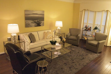 Photo of a traditional living room in DC Metro with yellow walls.