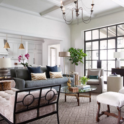Example of a transitional formal and open concept living room design in Austin with white walls