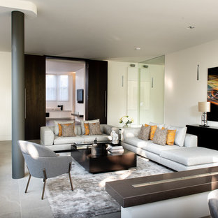 Design ideas for a contemporary living room in London with white walls and grey floors.