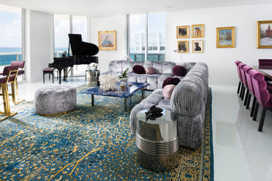Living room - contemporary open concept white floor living room idea in Miami with white walls