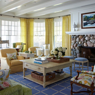 Inspiration for a coastal living room remodel in Chicago with beige walls, a standard fireplace, a stone fireplace and no tv
