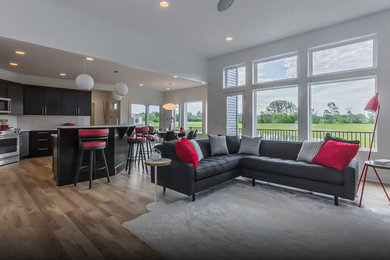 Mid-century modern living room photo in Grand Rapids