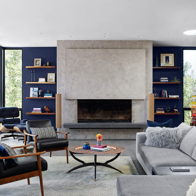 Inspiration for a 1960s open concept gray floor living room remodel in San Francisco with blue walls and a standard fireplace