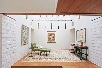 Inspiration for a mid-century modern living room remodel in Other