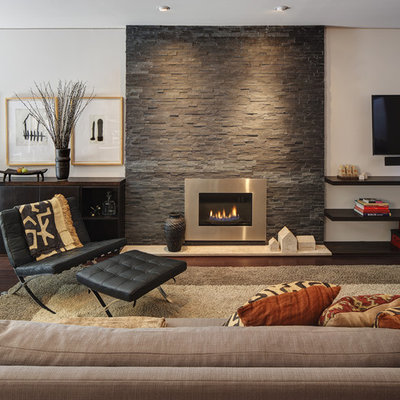 Example of a mid-sized trendy formal and open concept dark wood floor and brown floor living room design in Milwaukee with a metal fireplace, white walls, a ribbon fireplace and a wall-mounted tv