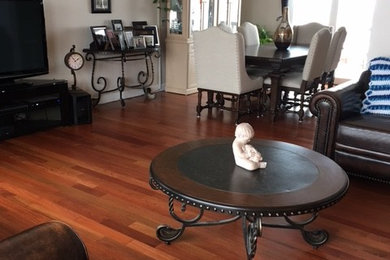 Photo of a medium sized classic open plan living room in Salt Lake City with dark hardwood flooring.