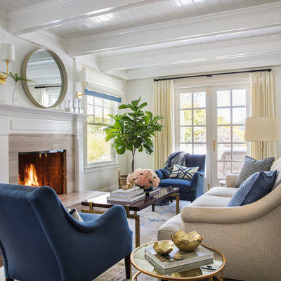 Elegant formal and open concept dark wood floor living room photo in San Francisco with white walls, a standard fireplace, a stone fireplace and no tv