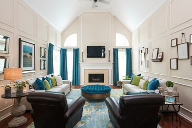Ejemplo de salón actual con paredes beige, suelo de madera oscura, todas las chimeneas y marco de chimenea de baldosas y/o azulejos