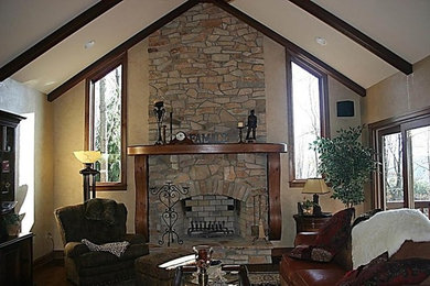 Example of a mid-sized mountain style formal and enclosed living room design in Other with beige walls, a standard fireplace, a brick fireplace and no tv