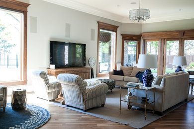 Example of a transitional living room design in Omaha