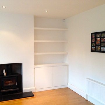 Minimalist White Alcove Cupboard and Floating Shelves