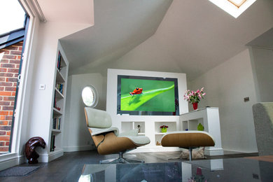 Photo of a medium sized contemporary formal enclosed living room in London with dark hardwood flooring, no fireplace and a built-in media unit.