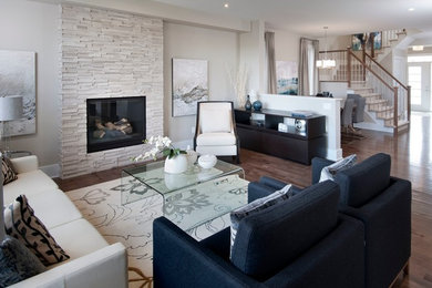 Mid-sized transitional formal and open concept dark wood floor living room photo in Ottawa with beige walls, a standard fireplace, a stone fireplace and no tv