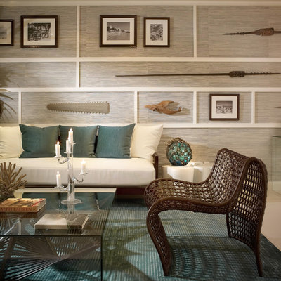 Living room - tropical living room idea in Miami with gray walls