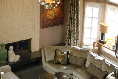 Example of a transitional open concept living room design in Los Angeles with beige walls, a standard fireplace and a stone fireplace
