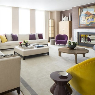 Large traditional formal enclosed living room in London with beige walls, beige floors, medium hardwood flooring and a ribbon fireplace.