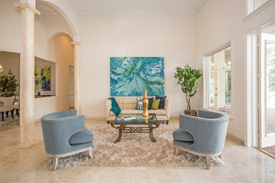 Living room - huge contemporary open concept travertine floor and beige floor living room idea in Tampa with beige walls