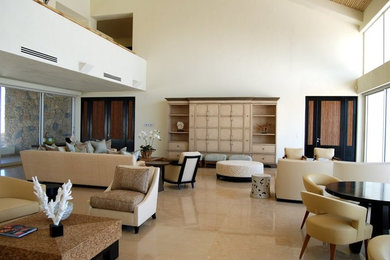 Example of a large minimalist open concept ceramic tile and beige floor living room design in Houston with white walls, no fireplace and a concealed tv