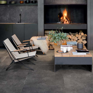Modern black living room with black stone look porcelain tile
