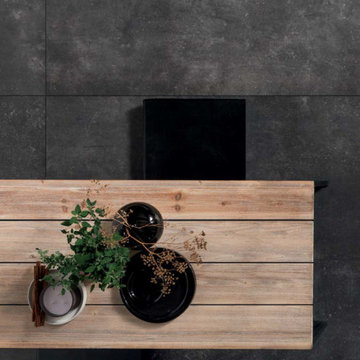Modern black living room with black stone look porcelain tile