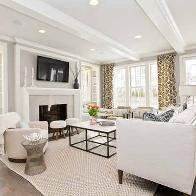 Living room - transitional living room idea in Minneapolis with a standard fireplace and a wall-mounted tv