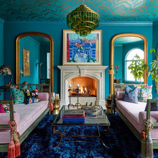 Living room - large victorian formal and enclosed living room idea in Chicago with blue walls, a standard fireplace and no tv