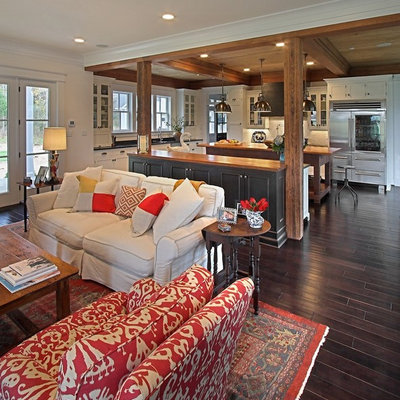 Example of a classic open concept dark wood floor and brown floor living room design in Richmond