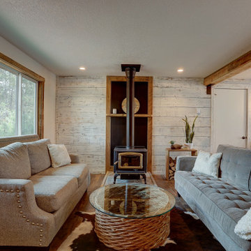 Modern Farmhouse Living Room with Fireplace and Barnwood Features