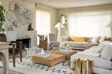 Inspiration for a transitional formal living room remodel in San Francisco with beige walls and a standard fireplace