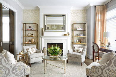 Inspiration for a medium sized traditional formal enclosed living room in Toronto with grey walls, medium hardwood flooring, a standard fireplace, a stone fireplace surround, no tv and brown floors.