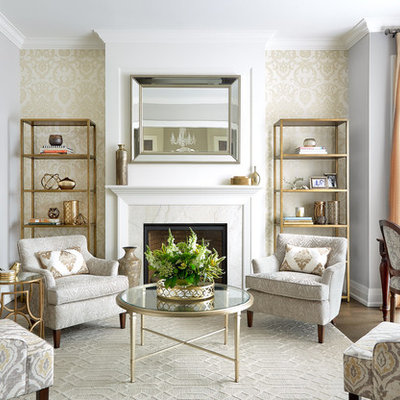 Living room - mid-sized transitional formal and enclosed medium tone wood floor and brown floor living room idea in Toronto with gray walls, a standard fireplace, a stone fireplace and no tv