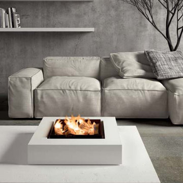 Modern grey living room with cement look porcelain tile and white fireplace