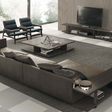 Modern grey living room with grey fabric look porcelain tile floors
