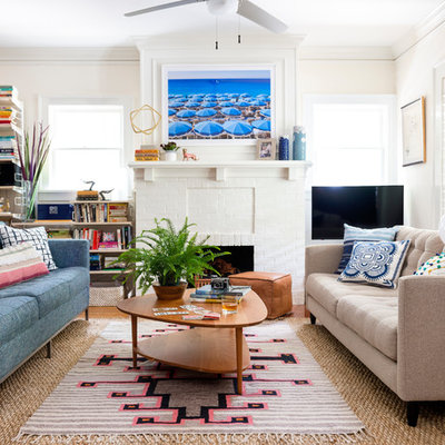 Inspiration for a mid-sized eclectic open concept living room remodel in Atlanta with white walls, a standard fireplace, a brick fireplace and a tv stand