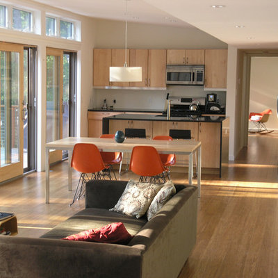 Example of a minimalist open concept living room design in New York