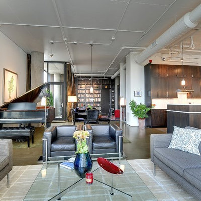 Inspiration for a modern open concept concrete floor living room remodel in Minneapolis with a music area