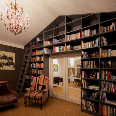 Minimalist living room library photo in Hamilton