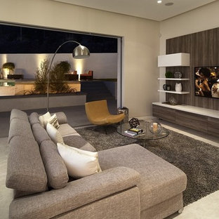 Immagine di un soggiorno moderno di medie dimensioni e aperto con sala formale, pareti bianche, pavimento in marmo e TV a parete