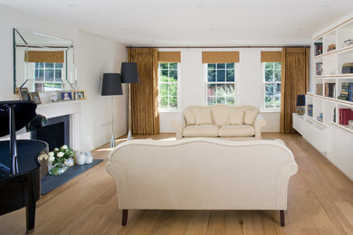 Photo of a modern living room in Cambridgeshire with white walls.