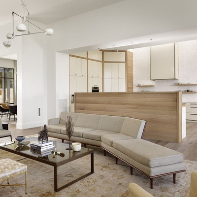 Inspiration for a contemporary open concept living room remodel in Austin with white walls