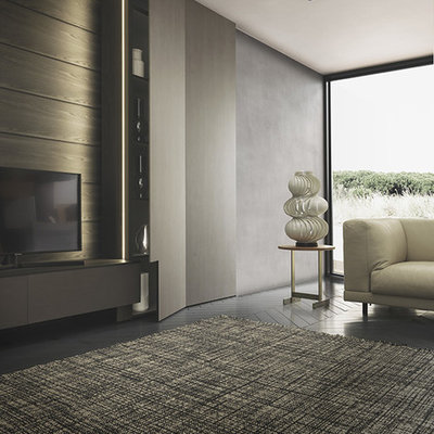 Inspiration for a modern living room remodel in Boston with a media wall