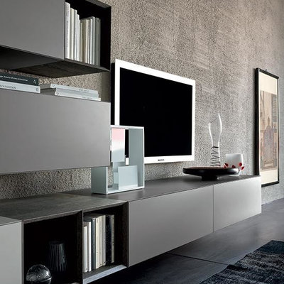 Living room - modern living room idea in Boston with a media wall