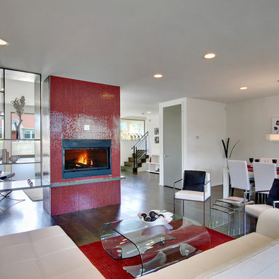 Example of a trendy living room design in Other with white walls, a standard fireplace and a tile fireplace