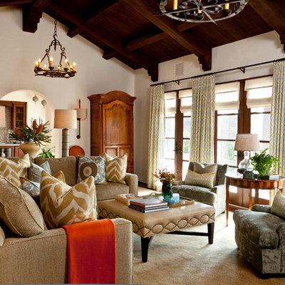 Mid-sized tuscan enclosed dark wood floor living room photo in Santa Barbara with beige walls, no fireplace and no tv