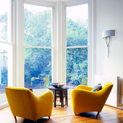 Danish living room photo in New York with white walls