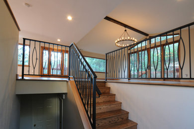Inspiration for a large rustic staircase remodel in Other